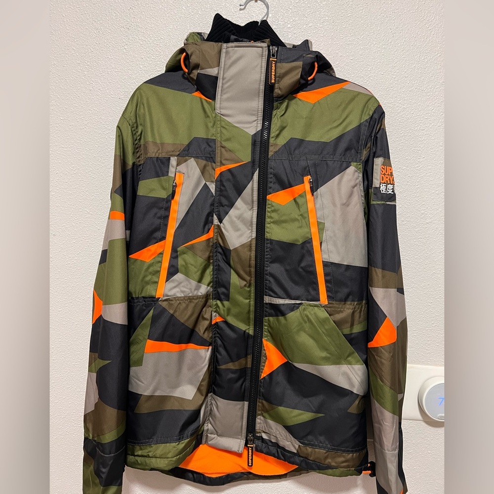 Superdry Men’s Hooded Jacket – Geometric Camo with Orange Accents (Size M)